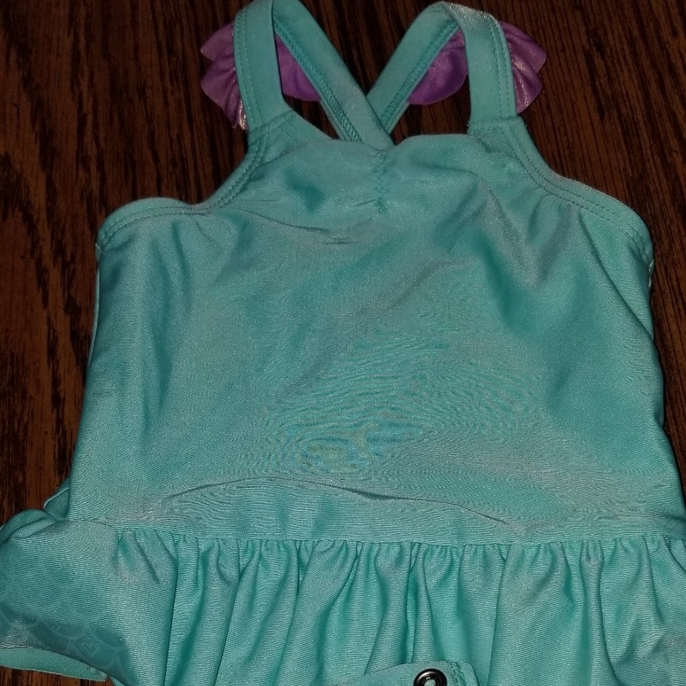 Infant swim suit with snap diaper area